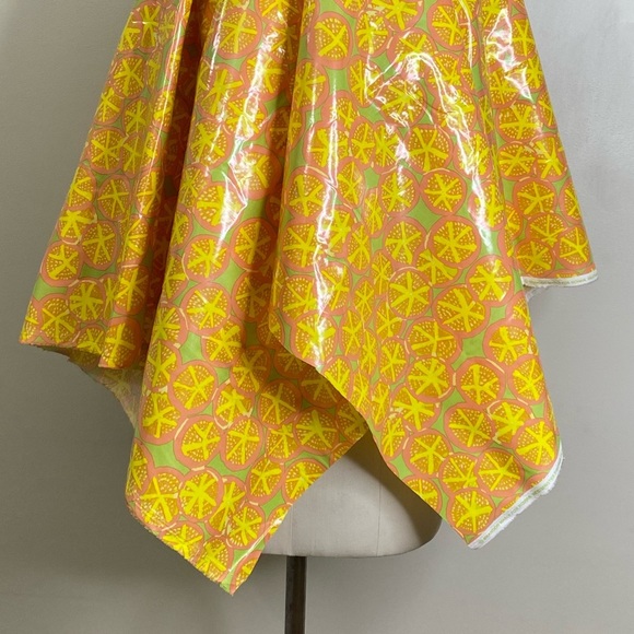 100% COTTON BASE FABRIC WITH WATERPROOFING PLASTIC OVERTOP IN A VIBRANT CITRUS - Picture 5 of 6